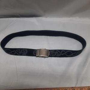 Reversible black belt, side 1 is black w/ grey dragons & side 2 is solid Black